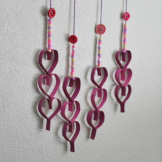 https://craftsbyamanda.com/cardboard-tube-dangling-hearts/